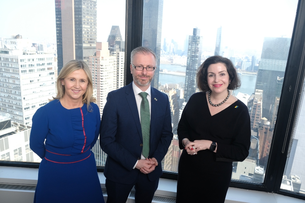 Two women and a man in an office in Manhattan.