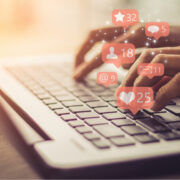 social media likes as a person types on a keyboard.