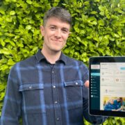 Man holding tablet computer.