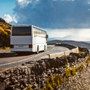 Bus going along Irish coastline.