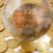 Coin with Irish harp in focus and sign 2022.
