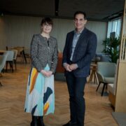 Man and woman in business wear.