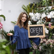 Woman opening a flower shop.