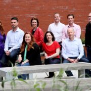 Group of people in a courtyard.
