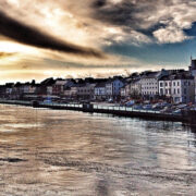Looking over across the river at sunrise to Waterford town.