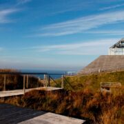 Ceide Fields Visitor Centre under a blue sky in Mayo.
