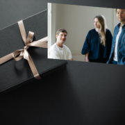 3 people inset on an image of a gift.