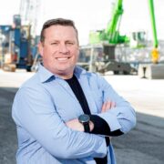 Man standing in Cork's docklands.