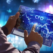 CFO looking at data on a tablet device.