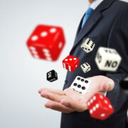 businessman throwing dice.