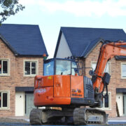 Digger in front of newly built homes in Meath.