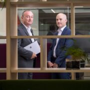 Two men in an office.