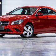 Shiny new red Mercedes.