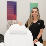 Blonde doctor in aesthetic clinic.