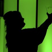 woman holding an award.