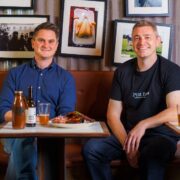 Two men in a restaurant.
