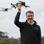 Man holding drone.