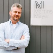 Man in pale blue shirt.