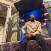 Man on stage at college green Dublin.