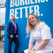 Man and woman outside a burger joint in Dublin.