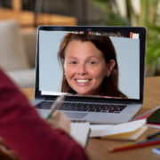 Woman inset on a computer screen.