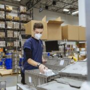 Man working in a specialist UPS hub.