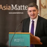 Man speaking from podium.