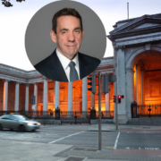 Dark-haired man inset on image of Bank of Ireland College Green.