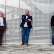 Three men in sports jackets.