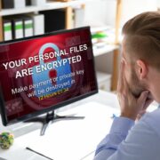 Businessperson experiencing a cyberattack.