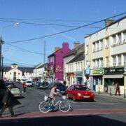 Patrick Street in Tullamore with people crossing the street.