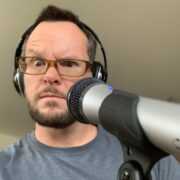 Man behind microphone.