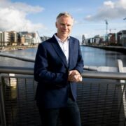 Man on bridge in Dublin.