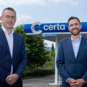 Two men in blue jackets.