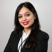 Woman wearing business suit.