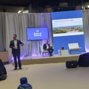 Man speaking at an event.