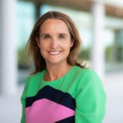 Woman in colourful dress.