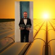 Man inset on image of solar farm.