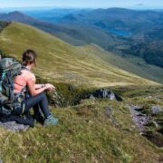Woman sitting on a mountain in Kerry.