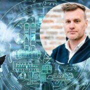 Man inset on image of businessperson reviewing carbon footprint.