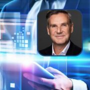 Man inset on image of business software in action.