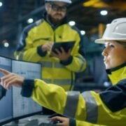 Woman engineering apprentice at work.