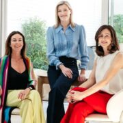 Three women sitting down.