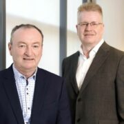 Two men in suits.