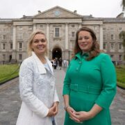 Two women standing in Trinity College Dublin.