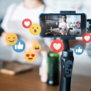 Woman presenting to video.
