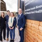 Two women and two men on a farm.