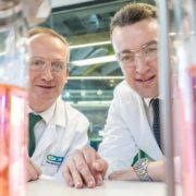 Two men in a chemistry lab.