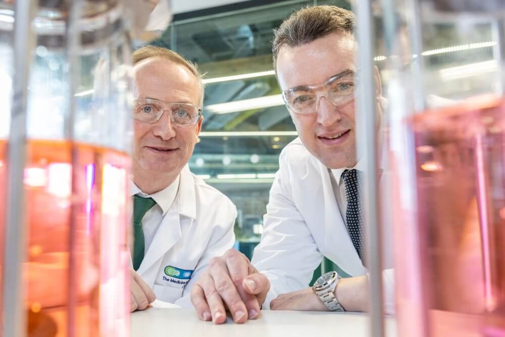 Two men in a chemistry lab.