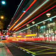 lights streak through an Irish city.